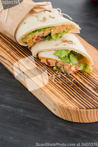 Image of Tortilla with chicken and vegetables