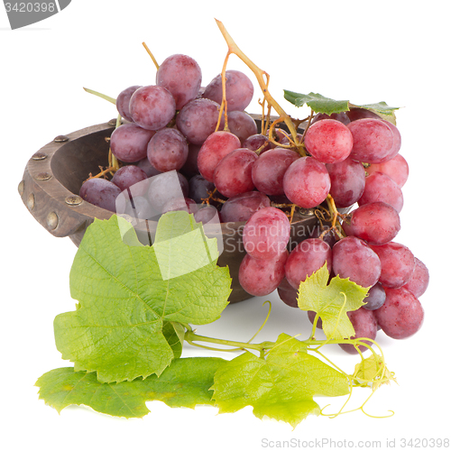 Image of Fresh red grapes in wood bown