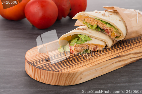 Image of Tortilla with chicken and vegetables