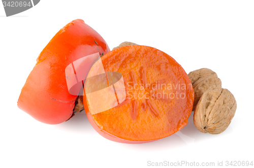 Image of Ripe persimmons and nuts