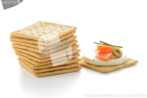 Image of Crackers with cheese and tomato