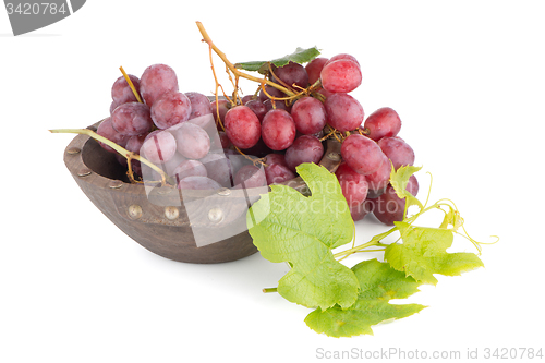 Image of Fresh red grapes in wood bown