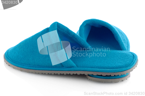 Image of A pair of blue slippers