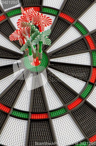 Image of Dart board with darts