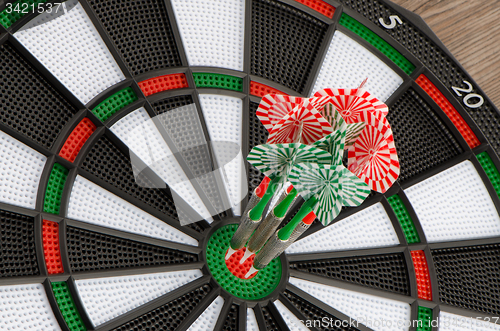 Image of Dart board with darts