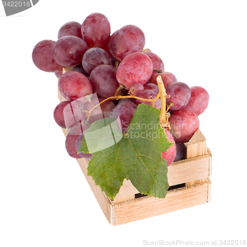 Image of Red grapes in wooden crate