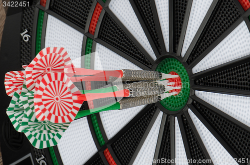 Image of Dart board with darts