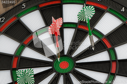 Image of Dart board with darts