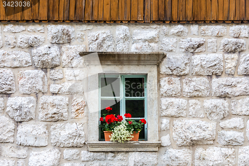 Image of Traditional alpine stone window.