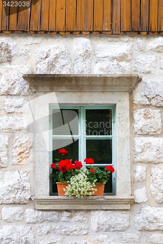 Image of Traditional alpine stone window.