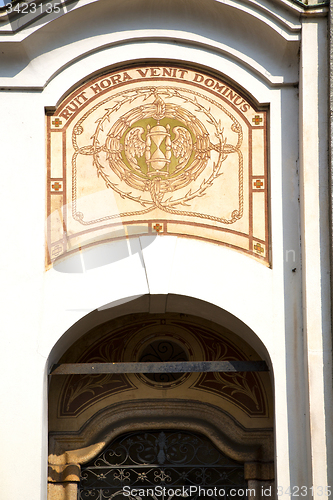 Image of abstract  church door        column  the milano old      closed 