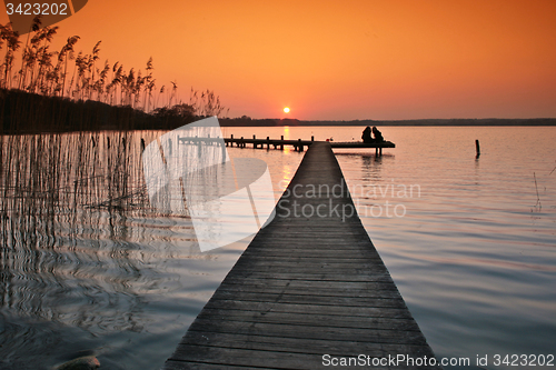 Image of Lake in denmark with a jetty in winter shot with colour graduate