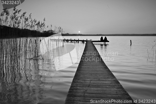 Image of Lake in denmark with a jetty in winter shot with colour graduate