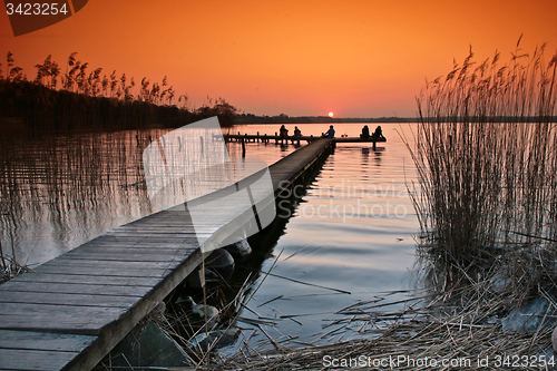 Image of Lake in denmark with a jetty in winter shot with colour graduate