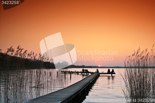 Image of Lake in denmark with a jetty in winter shot with colour graduate