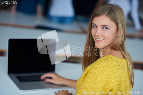 Image of portrait of happy smilling student girl at tech classroom