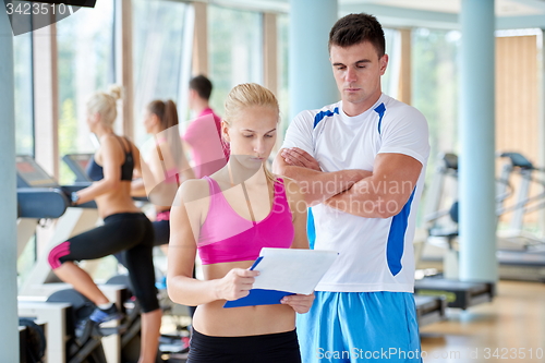 Image of people group in fitness gym