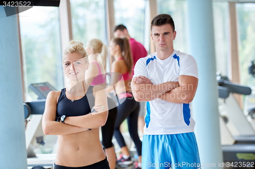 Image of people group in fitness gym