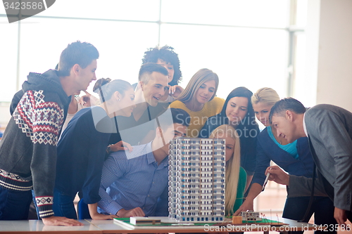 Image of group of students with teacher on class