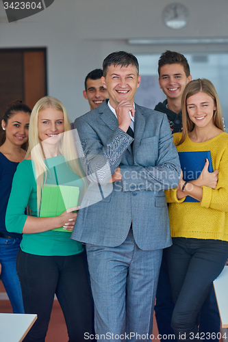 Image of group portrait of teacher with students
