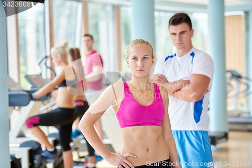 Image of people group in fitness gym