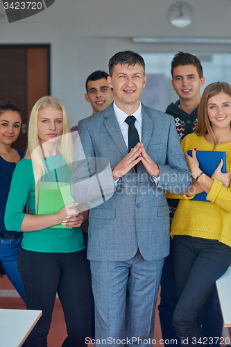 Image of group portrait of teacher with students