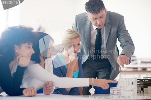 Image of group of students with teacher on class