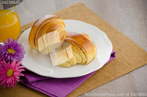 Image of Croissants with orange juice 