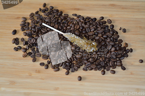 Image of sugar on the top of coffee beans