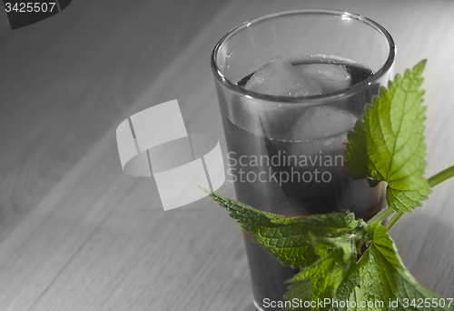 Image of cold tea with nettle and ice