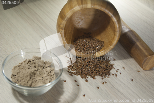 Image of bowl with flax flour and mortar