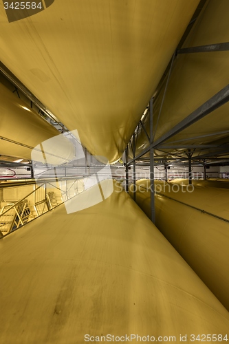 Image of Industrial interior with welded silos