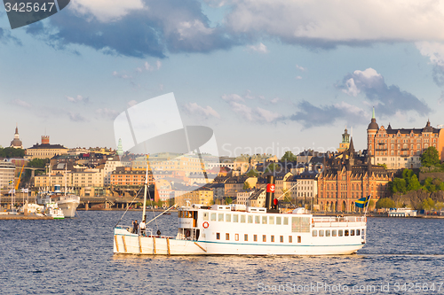 Image of Traditional ferry in Gamla stan, Stockholm, Sweden, Europe.