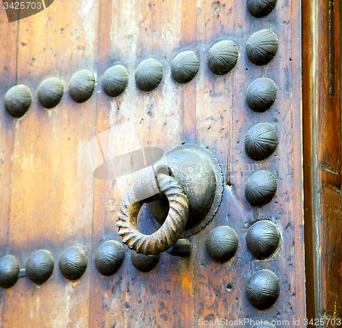 Image of brown  morocco in africa the old wood  facade home and rusty saf