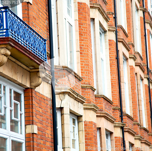 Image of old window in europe london  red brick wall and      historical 