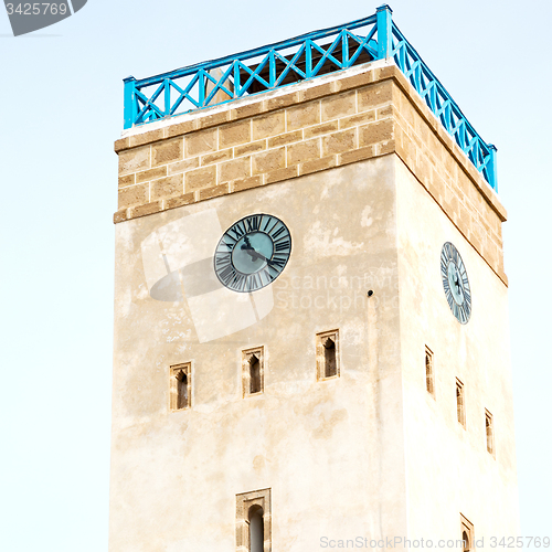 Image of old brick tower in morocco africa village and the sky