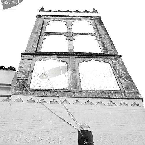 Image of old brick tower in morocco africa village and the sky