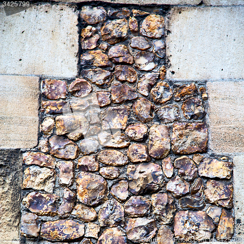 Image of wall texture in london england and stone in the floor