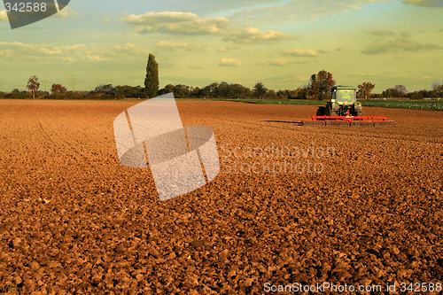 Image of tractor on field