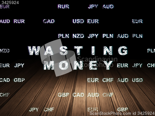 Image of Banking concept: Wasting Money in grunge dark room