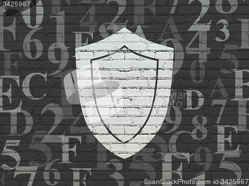 Image of Safety concept: Shield on wall background