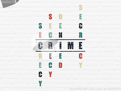 Image of Safety concept: word Crime in solving Crossword Puzzle