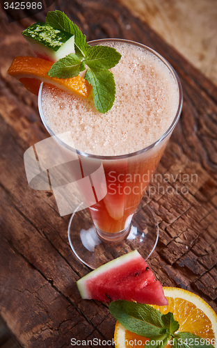 Image of glass watermelon and orange smoothie