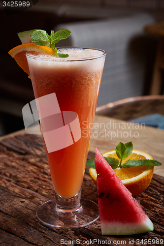Image of glass watermelon and orange smoothie