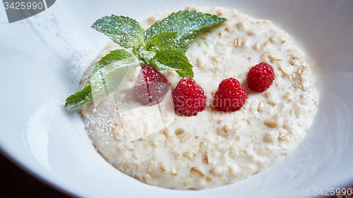 Image of oatmeal with raspberries