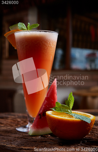 Image of glass watermelon and orange smoothie