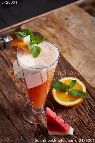 Image of glass watermelon and orange smoothie