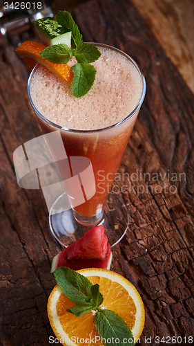 Image of glass watermelon and orange smoothie