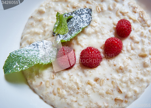 Image of oatmeal with raspberries