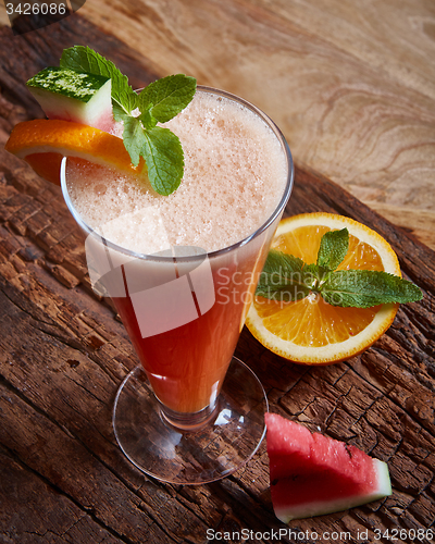 Image of glass watermelon and orange smoothie